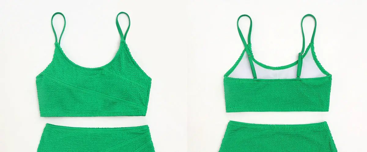 top down view of the front and abck of a green bikini top on table